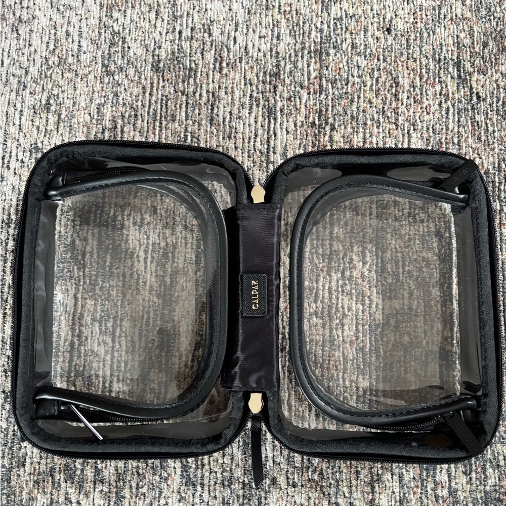 Calpak Small Clear Cosmetics Case in Black